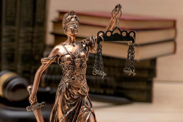 Lady Justice Law symbols in bokeh background