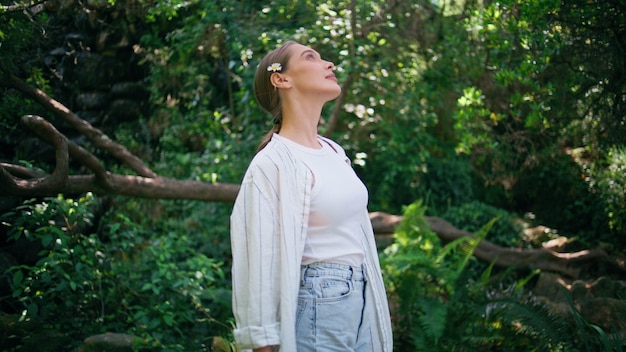 Lady looking park greenery standing sunny clearing closeup girl enjoying forest