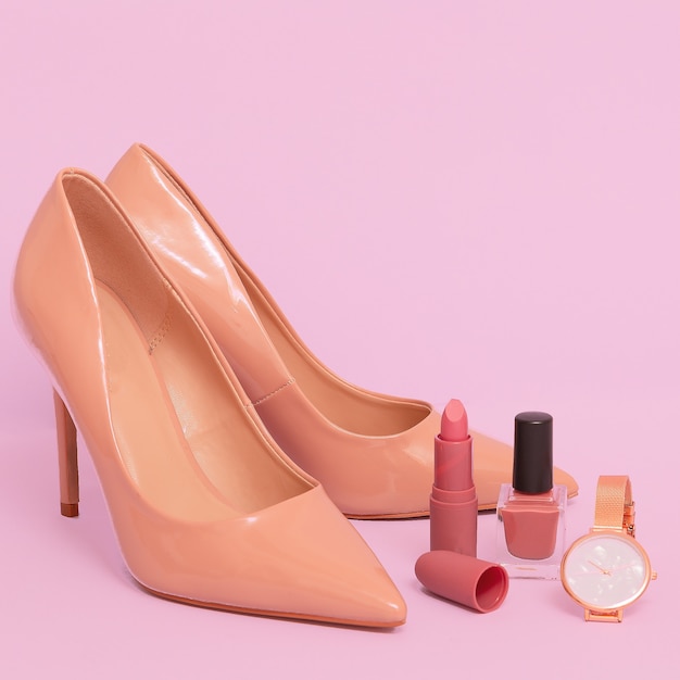 Lady shoes and Stylish jewelry and cosmetics Glamor fashion concept