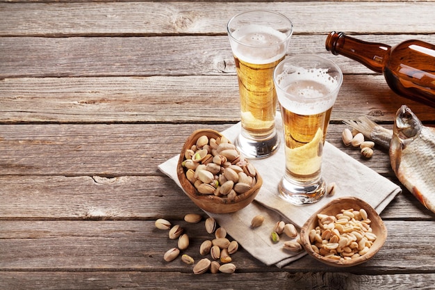 Lager beer glasses and snacks