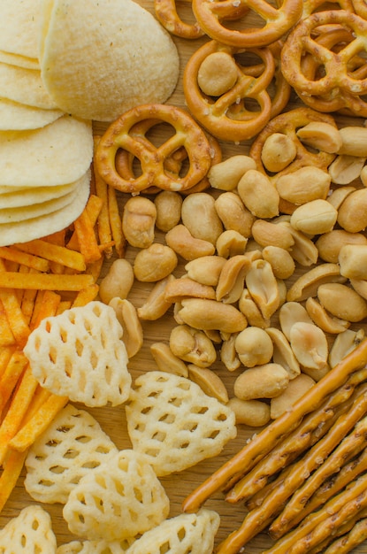 Lager beer and snacks on table