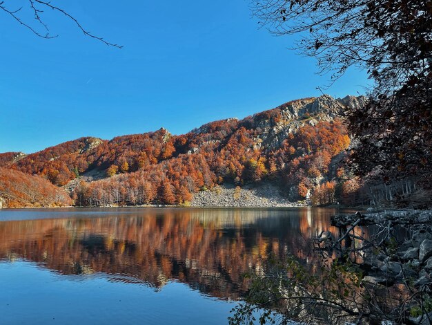 Lago santo lake reflections and autumn foliage appennino parma italy