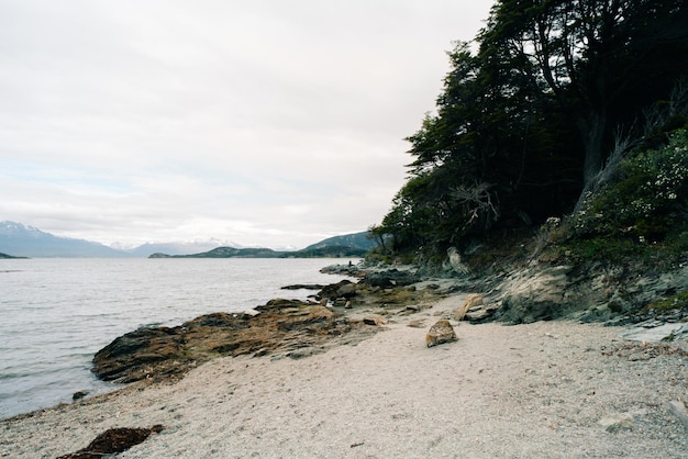 lake in Bahia Lapataia amidst mountains at Tierra del Fuego