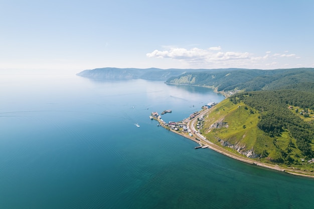 Lake Baikal is a marvelous blue jewel framed by scenic mountains and forests