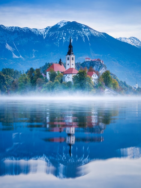 Lake Bled in Slovenia Church on an island in the middle of the lake Autumn landscape at dawn Large resolution photo