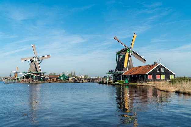 A lake in front of windmills in Netherlands