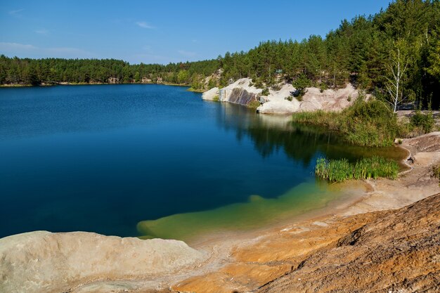 Lake in granite career resting place and tourist attraction