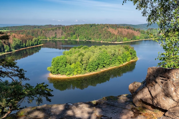 Lake and island with trees Water reservoir Sec Czech Republic Europe