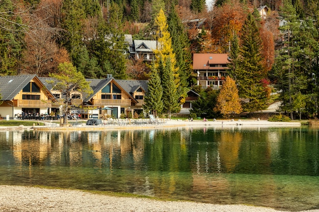 Lake Jasna with emerald clear water in autumn season, splendid view in Slovenian Alps