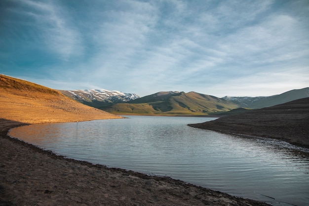 Lake and mountain under beautiful sky