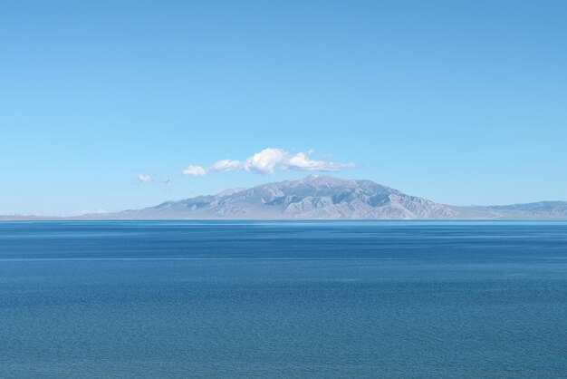 Lake and mountains in a sunny day shot in sayram lake in xinjiang china