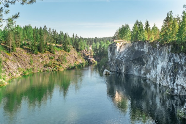 Lake in the rocks. Ruskeala Mountain Park. Marble quarry. Canyon among the rocks.