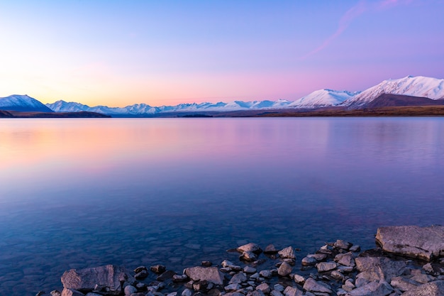 写真 テカポ湖の山の風景南島ニュージーランドの夕日