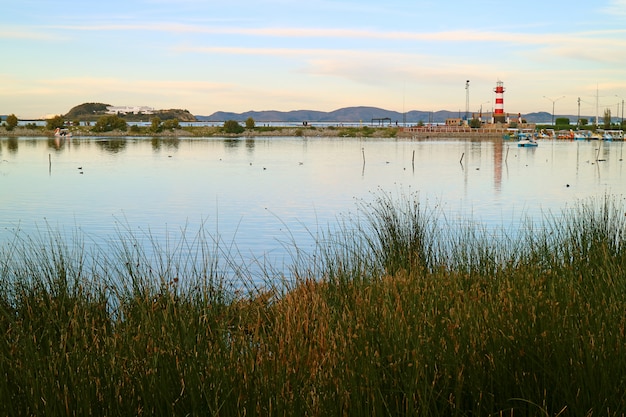 Lake Titicaca with Puno Cruise Ship Port, Puno Town, Peru