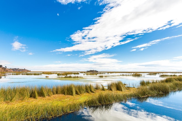 Lake TiticacaSouth America located on border of Peru and Bolivia It sits 3812 m above sea level making it one of the highest commercially navigable lakes in the world