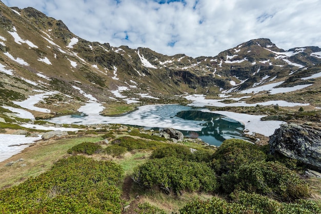 Lake Tristaina in Andorra Pyrenees at spring