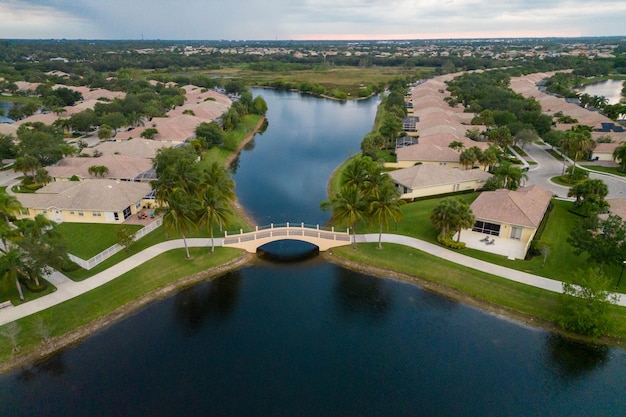 A lake with homes in the background