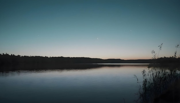 Photo a lake with a moon and a star on it