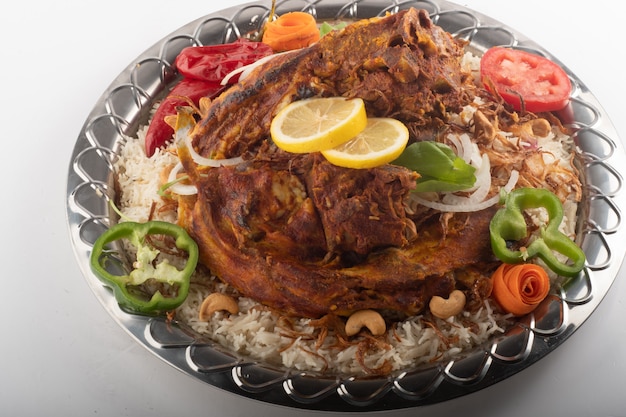 Lamb carcass with rice feast of popular Saudi food traditional Saudi rice cooked with meat