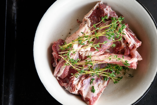 Lamb loin and thyme in a bowl