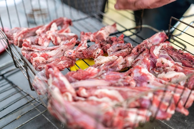 Lamb ribs cooked over an open fire closeup lamb chops grilling\
barbecue bbq originally made from