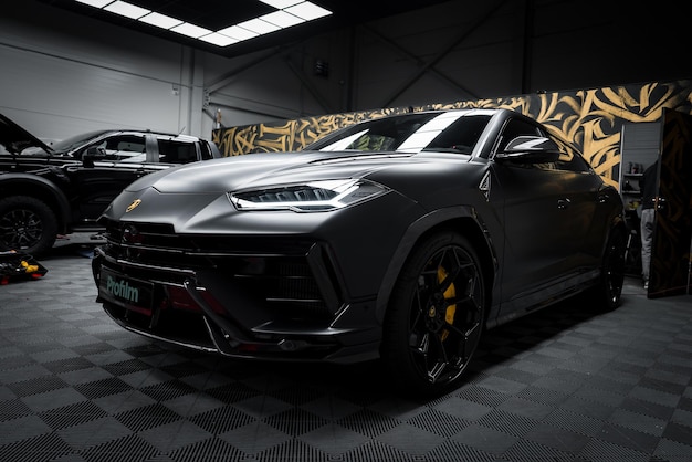 Lamborghini urus performante in matte black on checkered floor