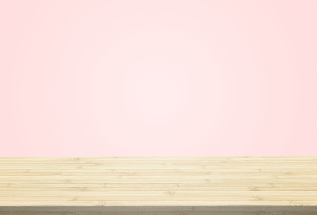 Laminate table top on pastel pink background can put or montage your products