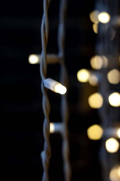 Lamp garland in the dark close up