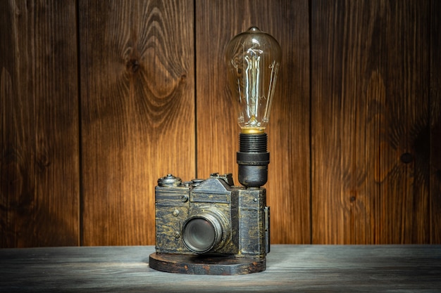 A lamp made of an old film camera