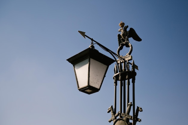 A lamp post with a dragon on it