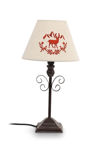 A lamp with a deer on it