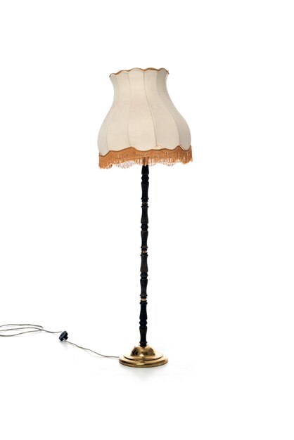 A lamp with a skirt and a cord.