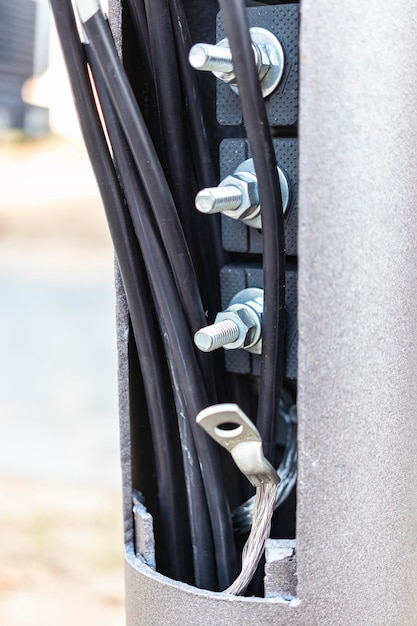 Lamppost with open hole inside is a power switch and electrical
cables electrical connection for a lamppost installation of street
lighting