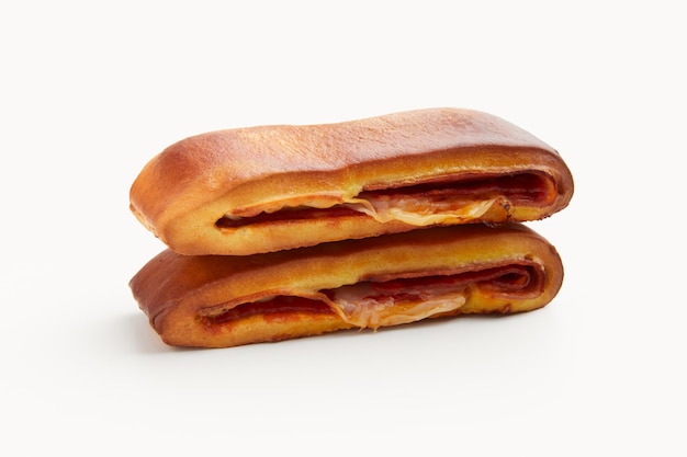 Lanche misto traditional portuguese sandwich with cheese and chorizo Tasty breakfast over white background