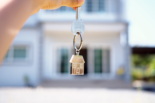 Landlord unlocks the house key for new home