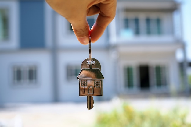 Landlord unlocks the house key for new home