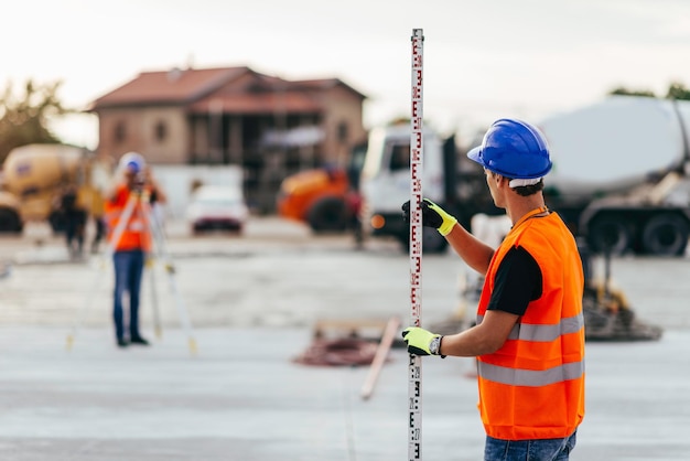 Landmeters op de bouwplaats