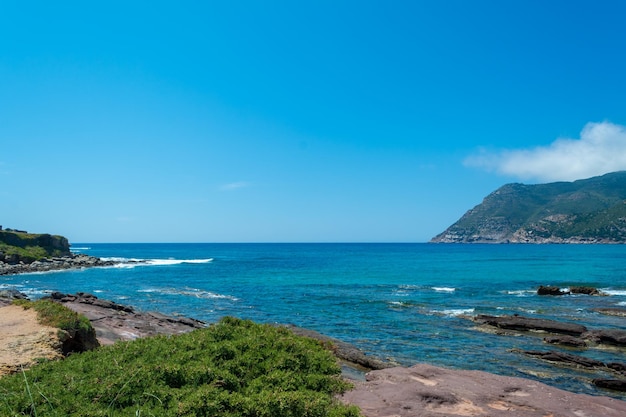 Photo landscape of the coast near porto ferro beach