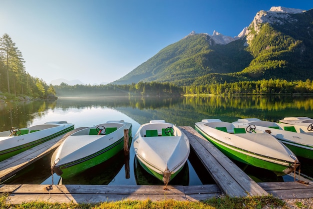 Landscape of Early morning near the lake with boats and mountains Beautiful sunny holiday Germany