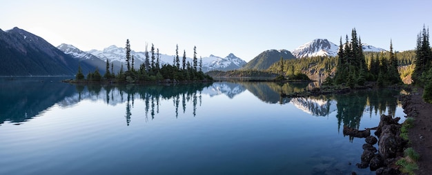 Landscape at the Glacier Lake with rocky islands and mountains in the background