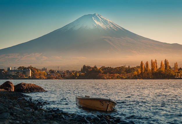 Landscape image of Mt. Fuji over Lake Kawaguchiko at sunrise in Fujikawaguchiko, Japan.