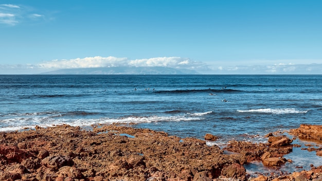 Landscape island. View of the ocean on a summer day.