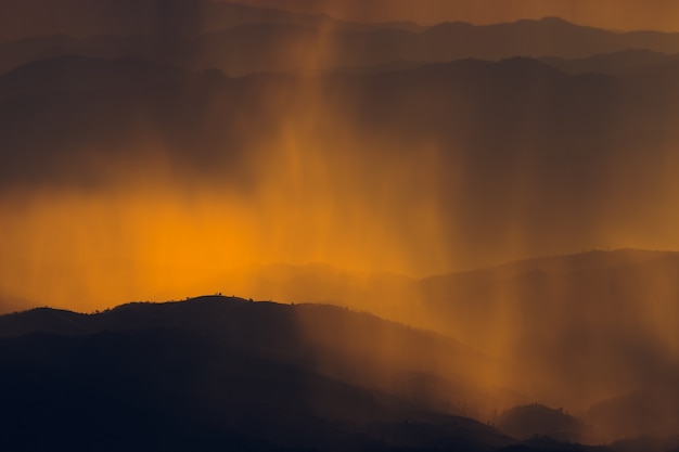 Landscape mountain and warm light and rainy in nature