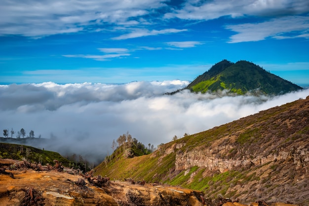 Landscape of mountains amount fog in Kawah Ijen volcano, Java, Indonesia.