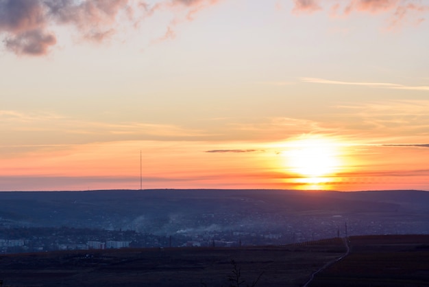 Landscape of Negresti village at red sunset in Moldova