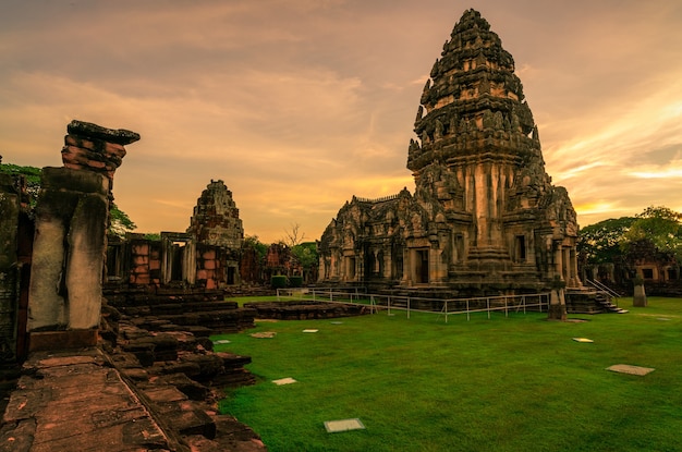 Landscape of Phimai Historical Park with sunset sky. Landmark of Nakhon Ratchasima, Thailand. Travel destinations. Historic site is ancient. Ancient building. Khmer temple classical architecture.