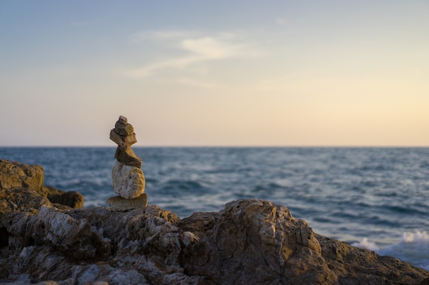 Landscape photography of rocky hill near the sea.