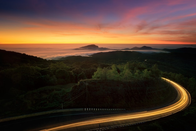 Landscape of road in the middle of nature on sunrise time