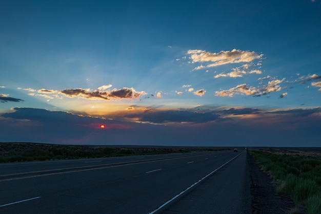 Landscape scene and sunrise above road Highway in USA