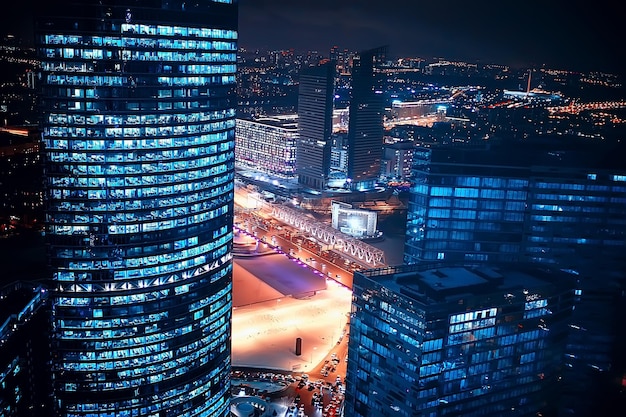 landscape skyscrapers night / business center in a night landscape, winter lights in the windows of houses in the business district